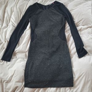 Black dress with metallic silver threads. Size Small. Long sleeve.